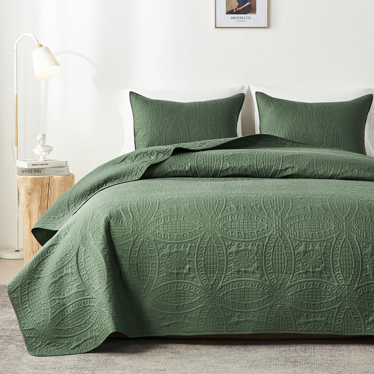 Akkialla Queen Quilt in olive green with coin pattern adds elegant texture to bed
