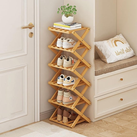 Akloya vertical narrow shoe rack folded for compact storage and portability.