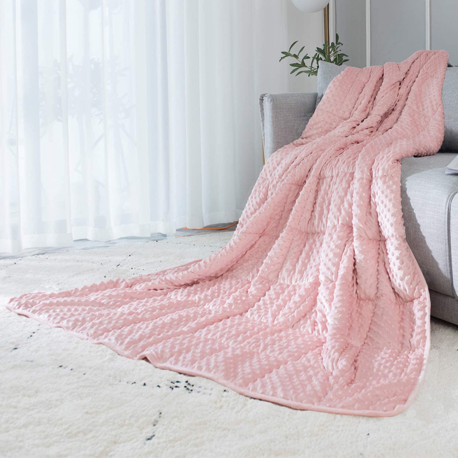 ALANSMA pink reversible weighted blanket closeup shows soft velvet texture for cozy nights.