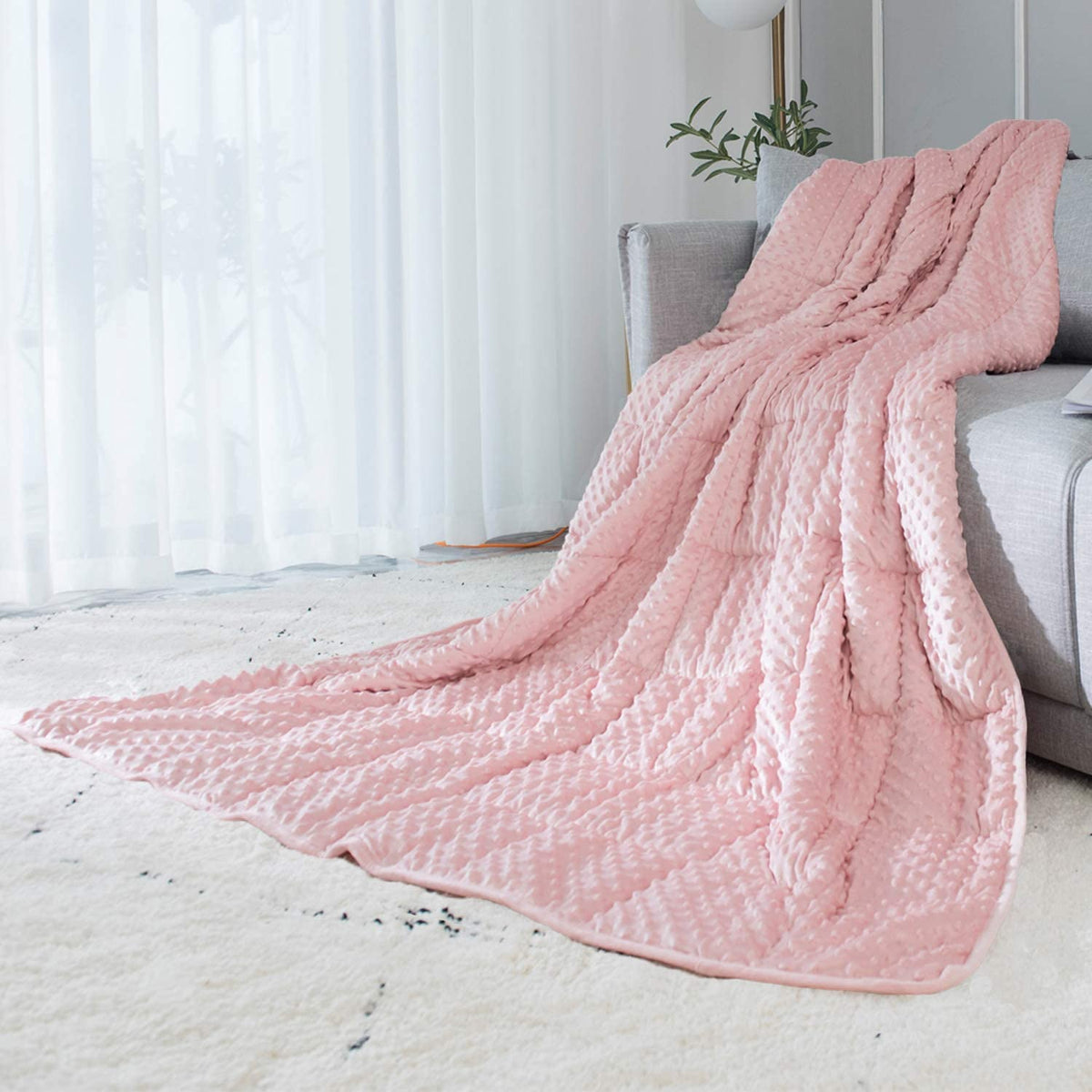 ALANSMA pink reversible weighted blanket closeup shows soft velvet texture for cozy nights.