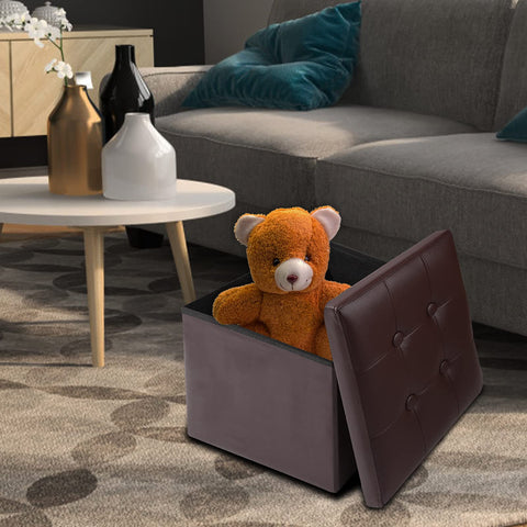 ALASDO ottoman used as a coffee table in a living room