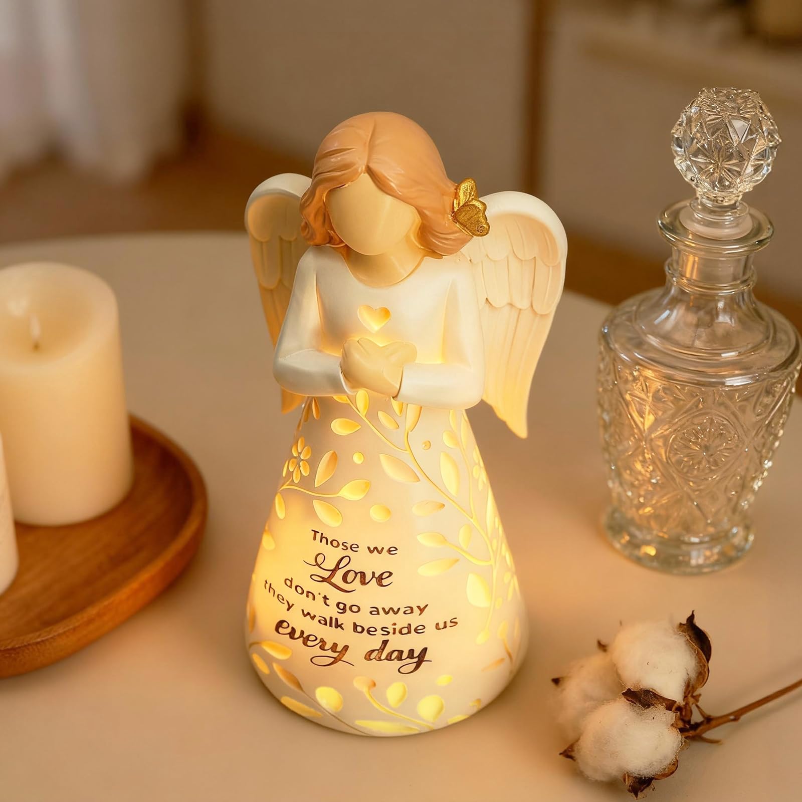 AlevaHive lighted angel figurine serves as comforting memorial decor.
