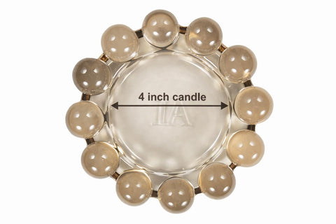 Alice Lane bubble dish supports pillar candles with clean wax catching