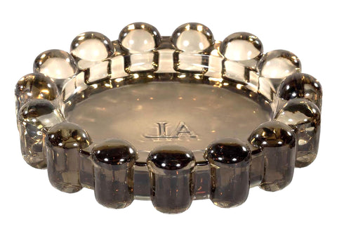 Alice Lane Original Bubble Candle Dish Large smoky amber glass on a table, elegant decor
