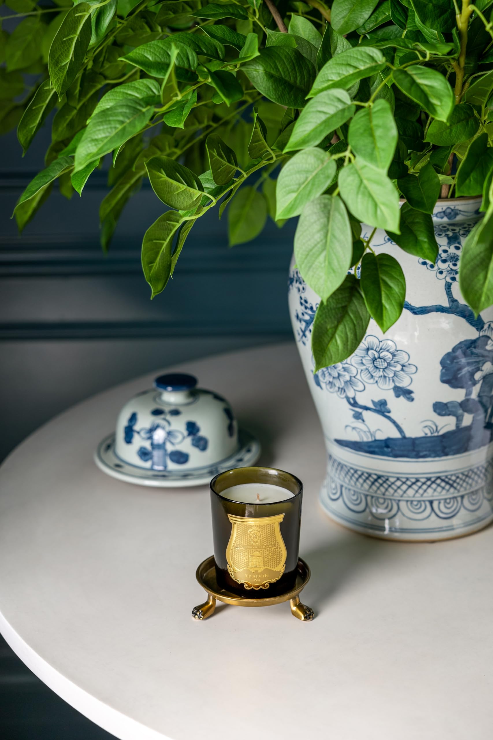 Alice Lane round-clawfoot dish dresser display enhancement.