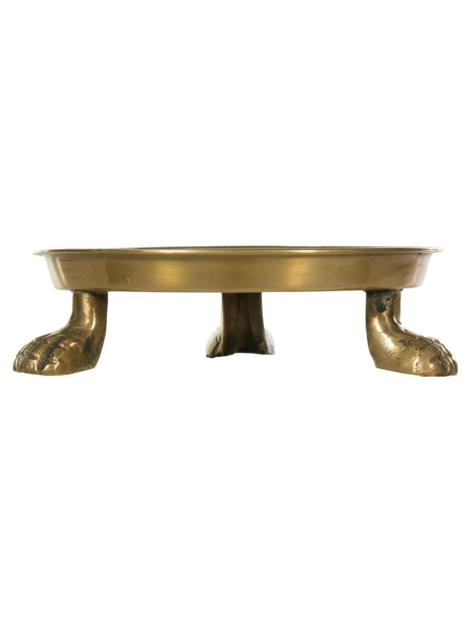 Alice Lane round-clawfoot dish gold finish closeup, showcasing craftsmanship.