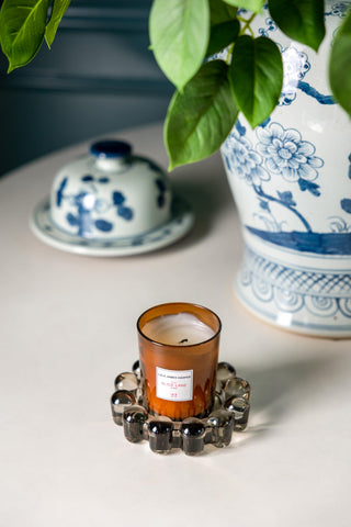Smoky amber glass adds warmth and a luxe accent to decor.