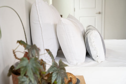 AllerEase pillow protector in breathable cotton for cool, comfortable nights.