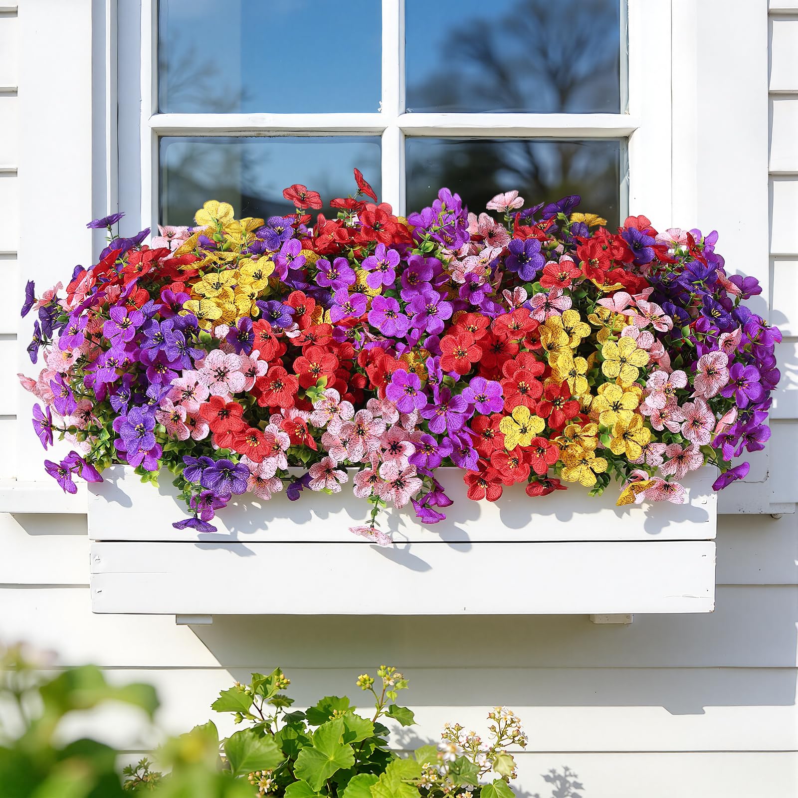 Alupssuc Colorful spring flowers in red, purple, yellow add cheer.