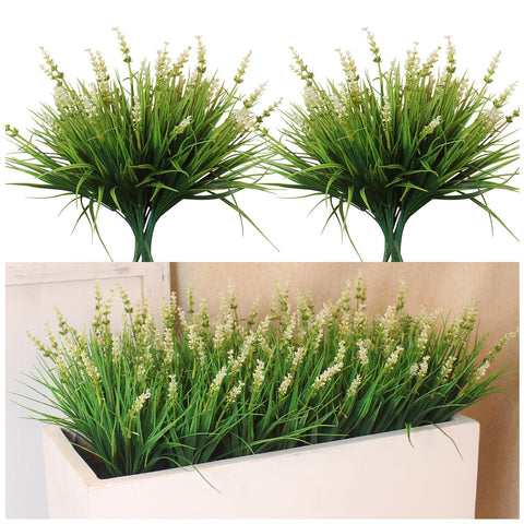 Alyptus white faux monkey grass bundles arranged in a planter for outdoor color.