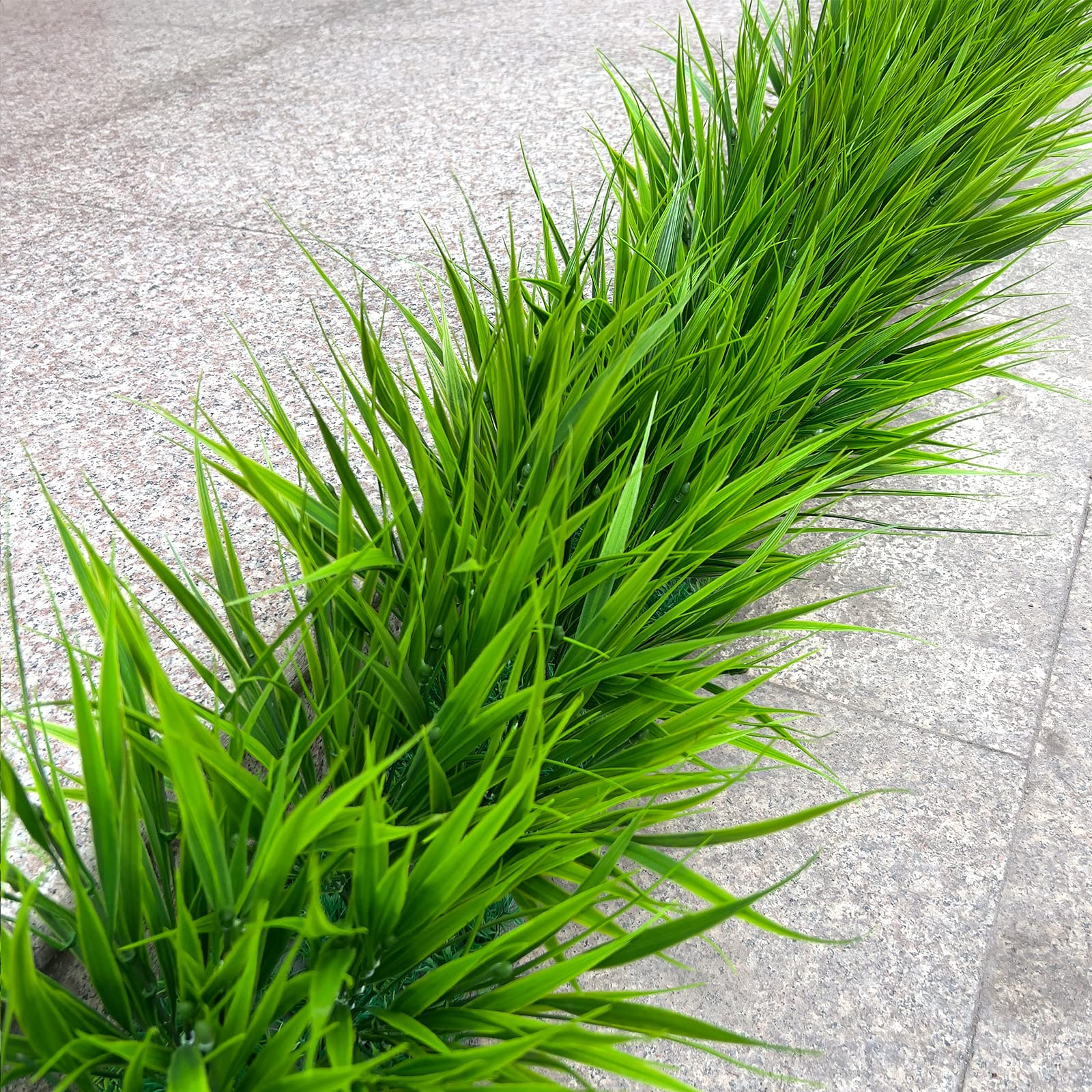 Alyptus window box decor with faux plants for vibrant exteriors.