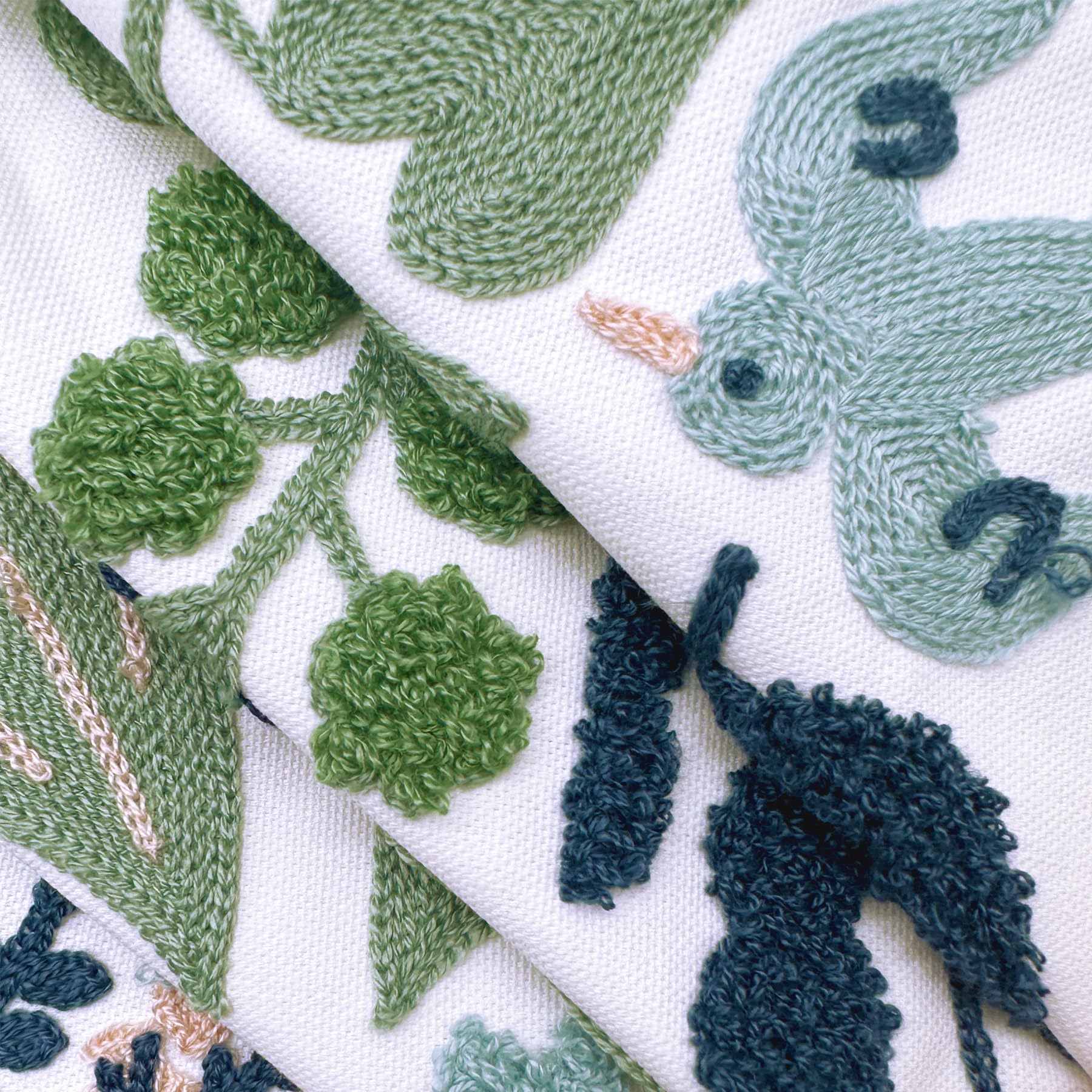 Alysheer vibrant embroidery detail adds texture and artisanal charm.