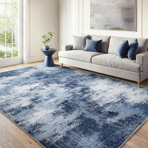 AMADA HOMEFURNISHING dark blue rug adds depth to modern interiors.
