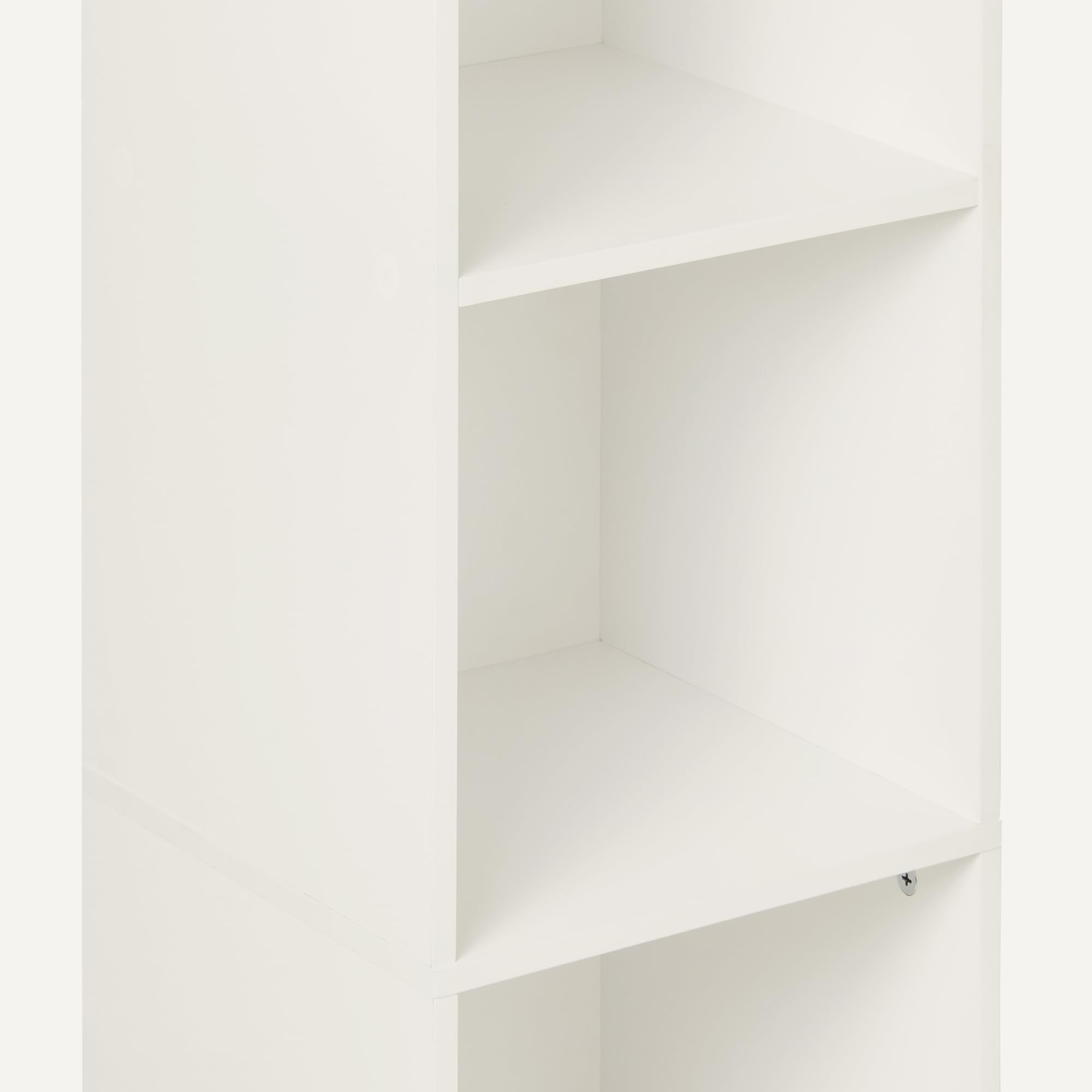 Amazon Basics 5-Cube Bookcase with cubes demonstrates modular storage options