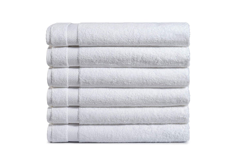 Amazon Basics 6-pack bath towels folded, showing premium cotton softness.