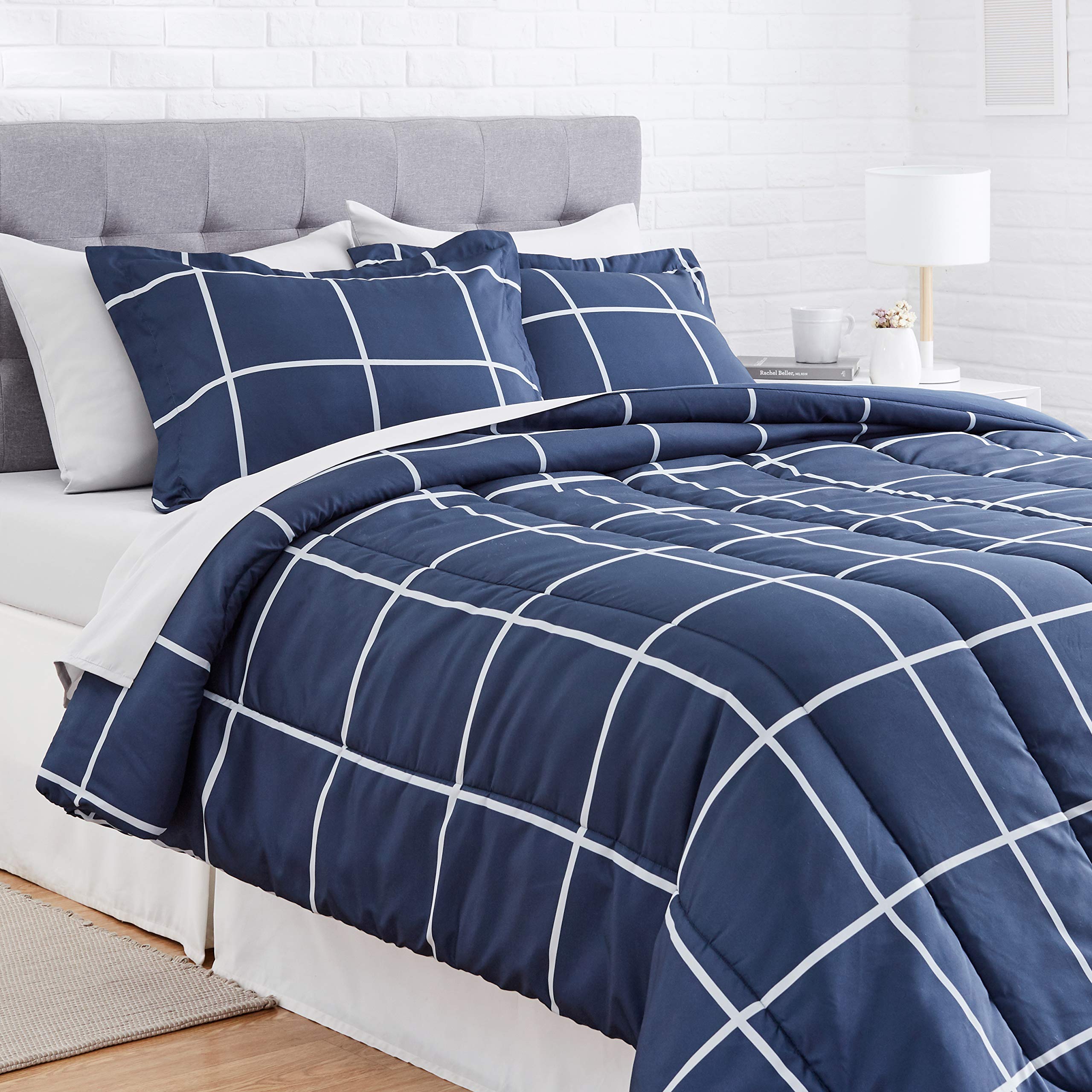 Amazon Basics bed-in-a-bag displayed in a dorm room setup