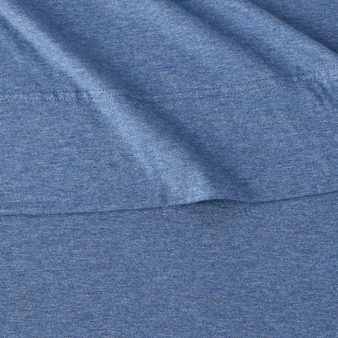 Amazon Basics bed set on bed shows breathable fabric for comfortable nights.