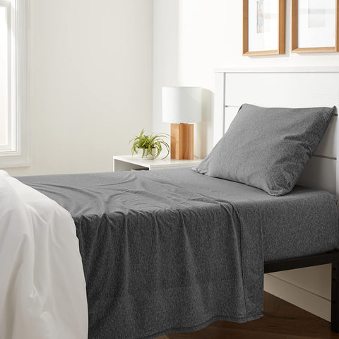 Amazon Basics breathable 3-piece bed sheet set twin flat sheet on bed, soft jersey knit comfort