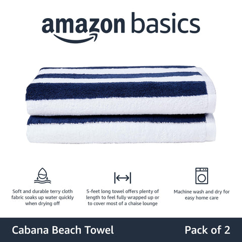 Amazon Basics cabana stripe beach towel spread over lounge chair for poolside comfort
