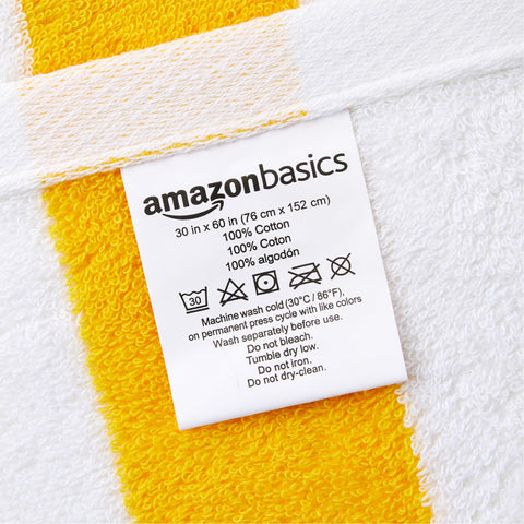 Amazon Basics cabana stripe yellow towel closeup weave showing soft fibers and durability.