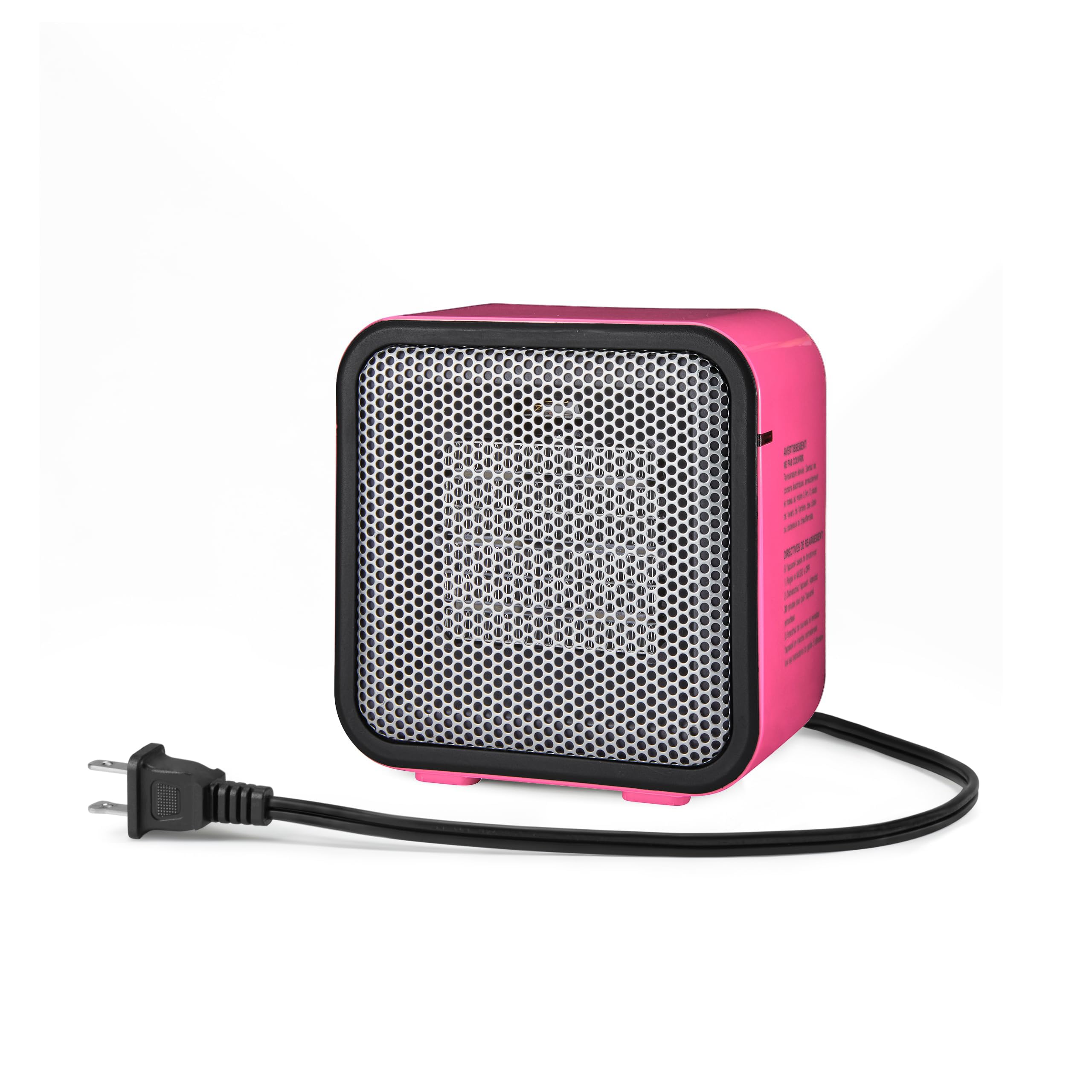 Amazon Basics ceramic space heater on a desk showing compact design for small spaces