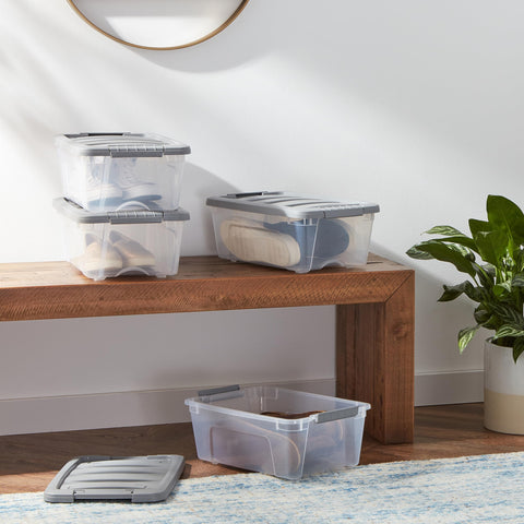 Amazon Basics clear storage bin with gray lid enables quick content identification.