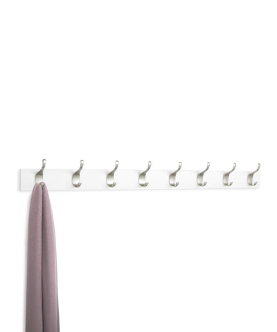 Amazon Basics coat rack with flush wood base complements modern interiors.