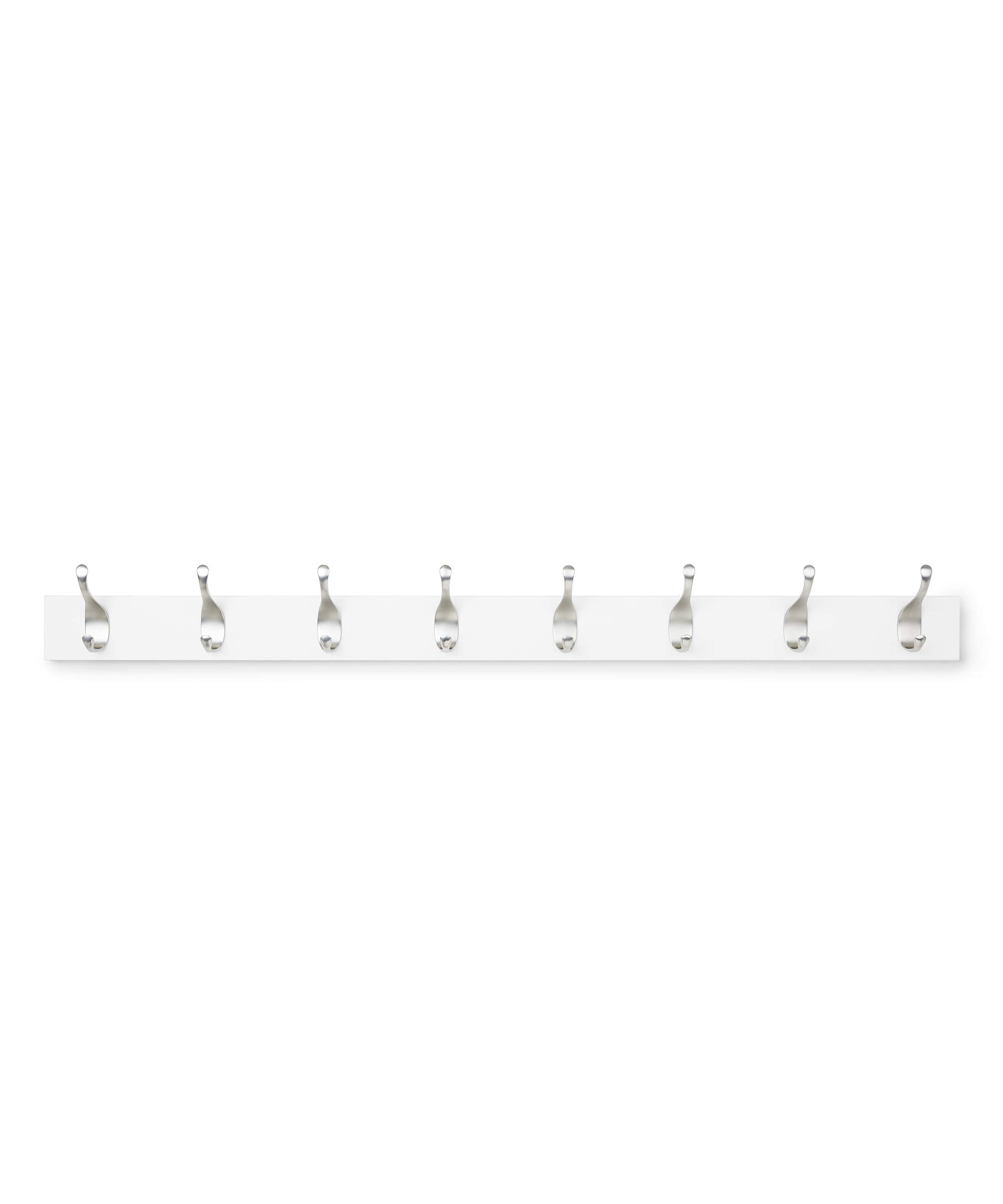 Amazon Basics 8-hook wall mounted coat rack with wood base keeps entryway organized.