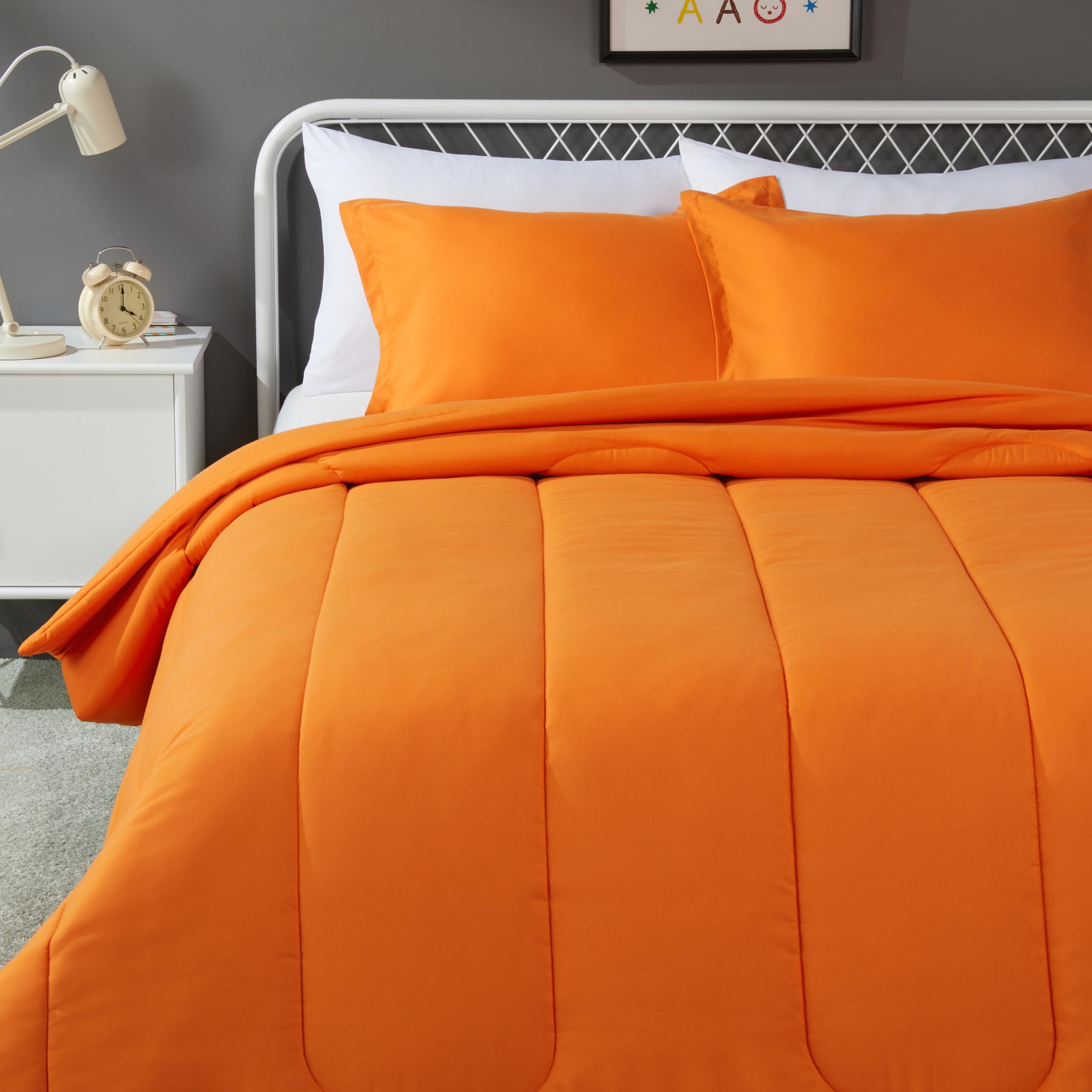 Amazon Basics comforter fabric closeup highlighting soft microfiber and cozy texture.
