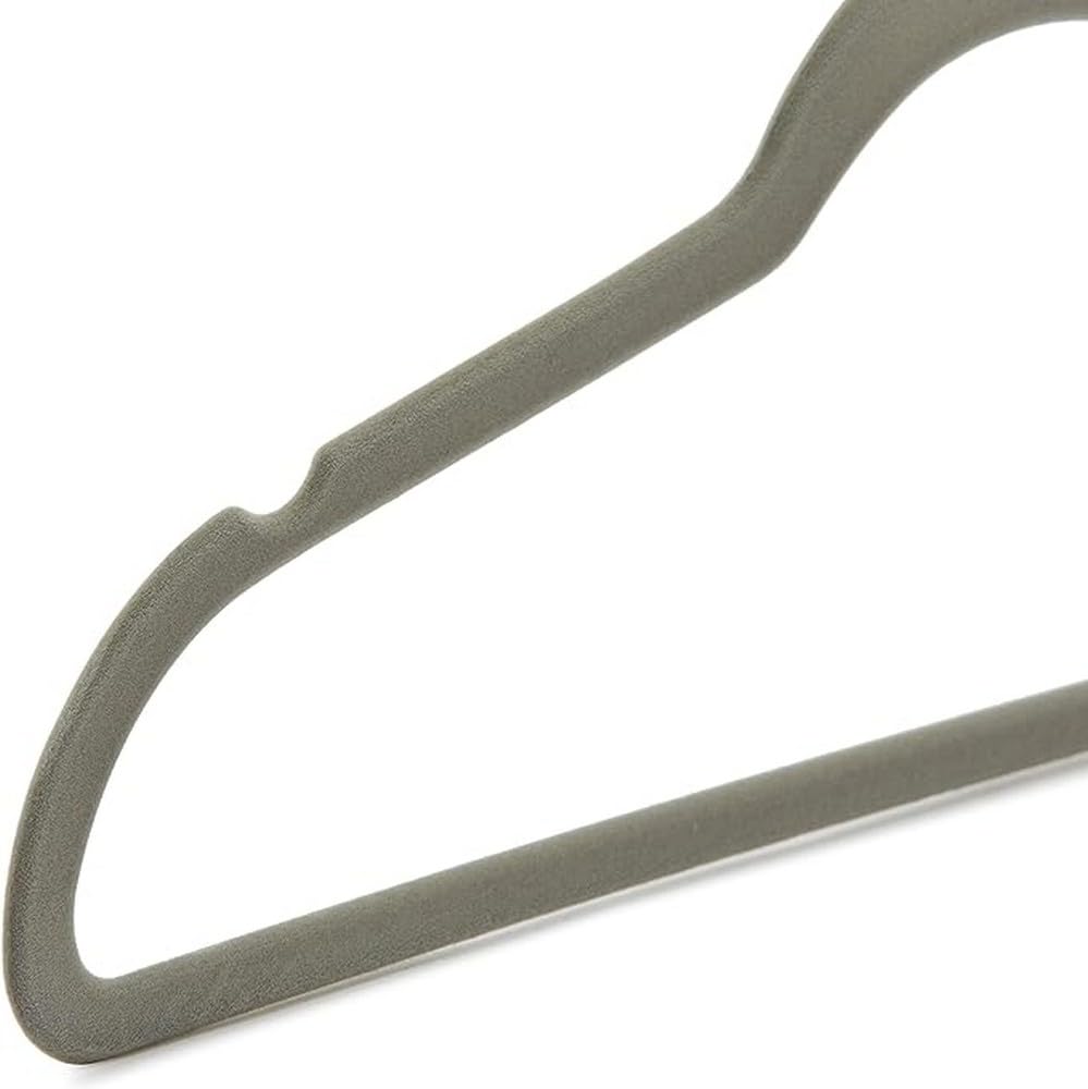 Amazon Basics 100-pack hangers in a compact box for easy closet organization.