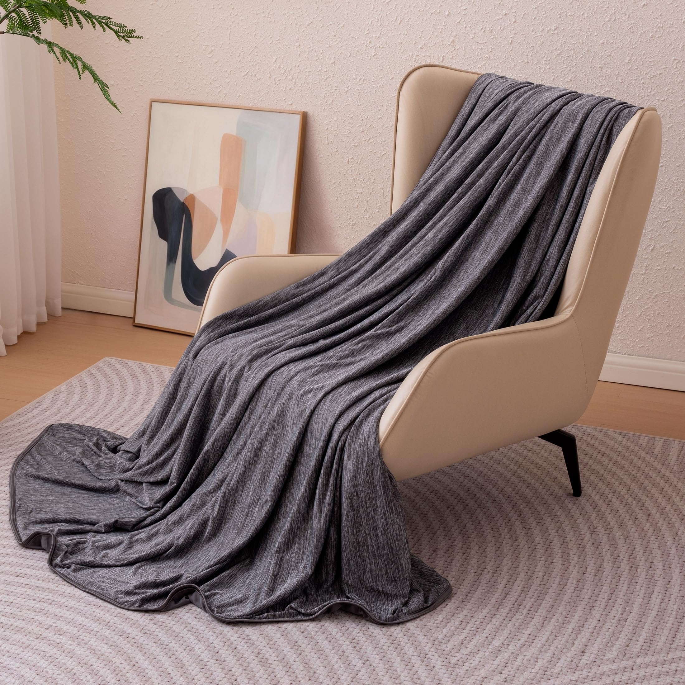 Amazon Basics cooling blanket demonstrates double-sided cooling for hot sleepers.