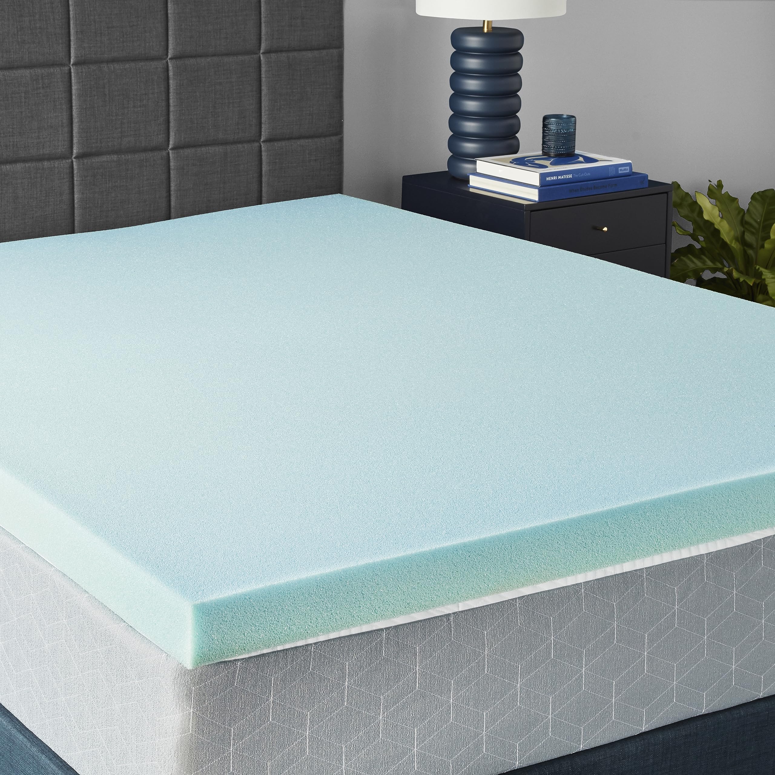 Amazon Basics cooling gel-infused topper on a queen bed for cooler, supportive sleep.