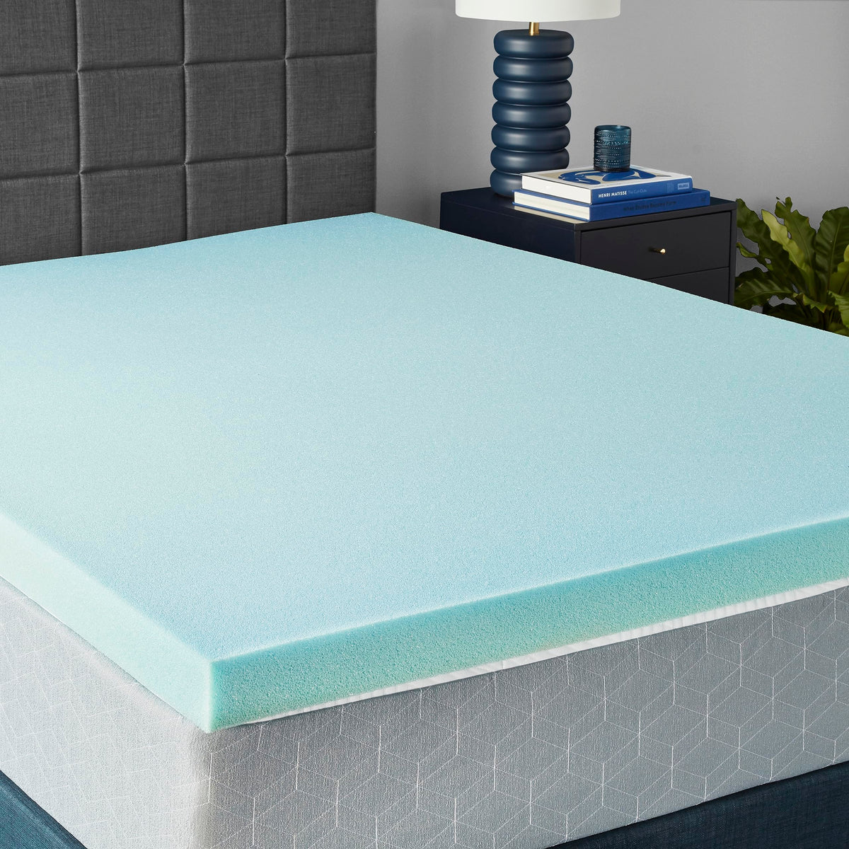 Amazon Basics cooling gel-infused topper on a queen bed for cooler, supportive sleep.