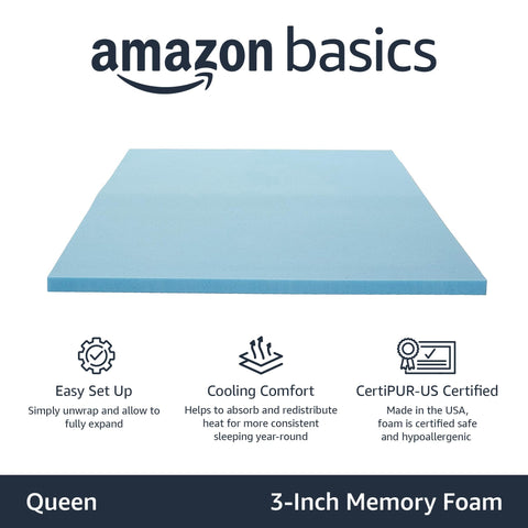 Amazon Basics memory foam topper unrolled and expanding for easy setup.