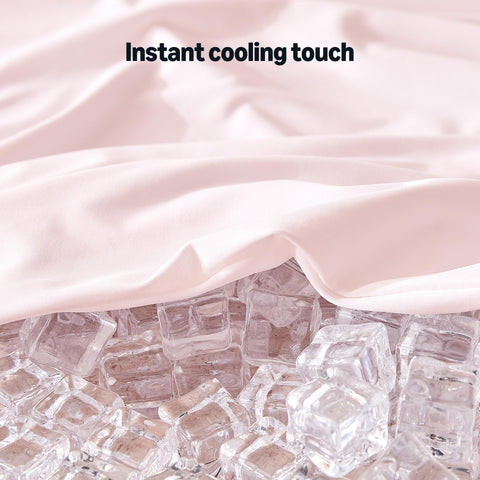 Amazon Basics cooling sheets folded in pink highlight lightweight, breathable surface.