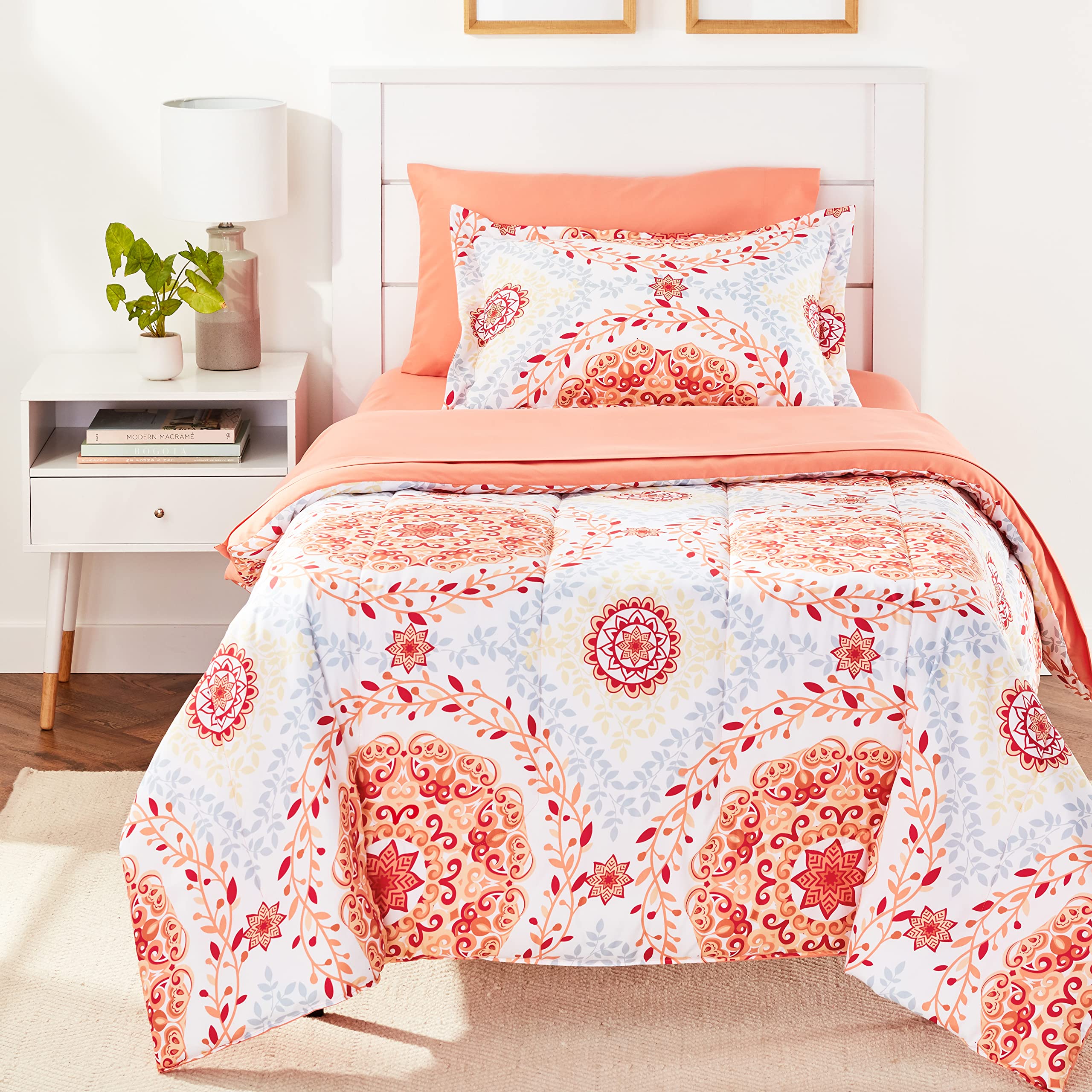 Amazon Basics coral medallion comforter set on twin bed showing cohesive design and color
