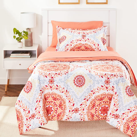 Amazon Basics coral medallion comforter set on twin bed showing cohesive design and color