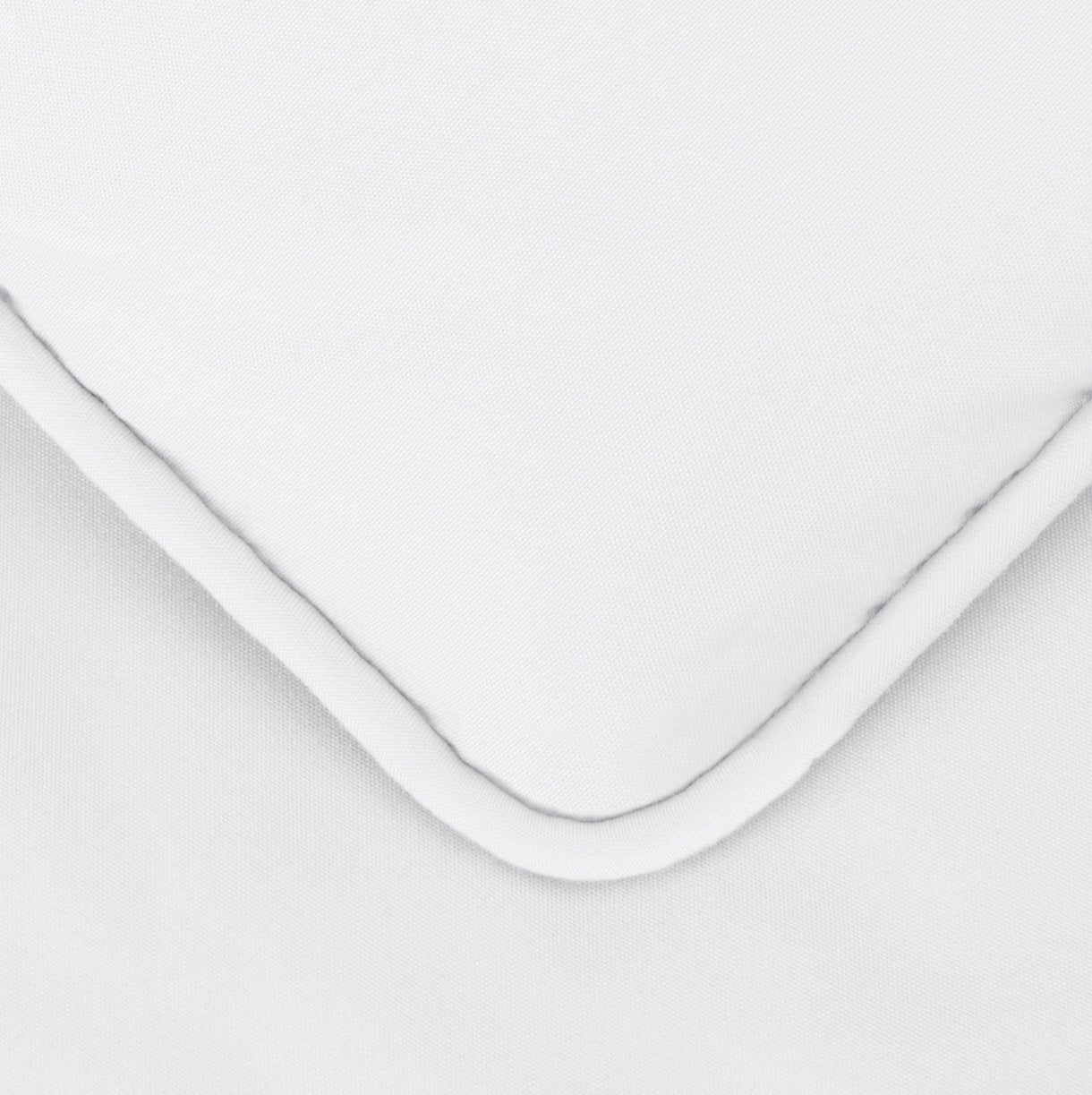 Amazon Basics down-alternative fill provides warmth without bulk for all-season use.