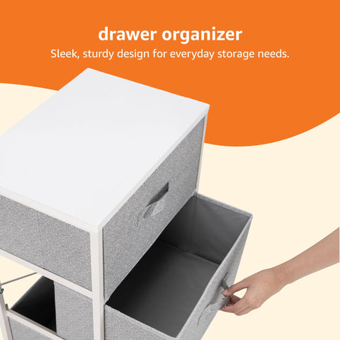 Open fabric drawer of Amazon Basics organizer highlighting easy access