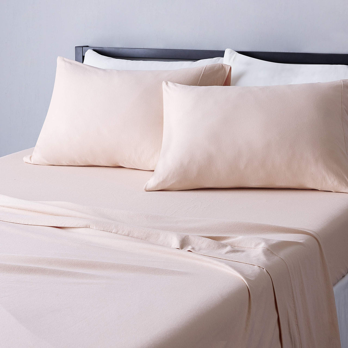 Amazon Basics flat sheet in blush offers breathable cotton comfort and easy care.