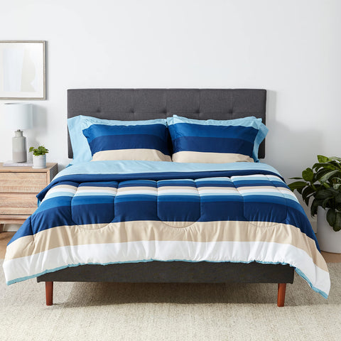 Amazon Basics full/queen blue stripe comforter with a soft microfiber weave for cozy nights.