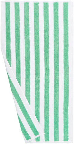 Amazon Basics green cabana stripe towel displayed in a bathroom setting.