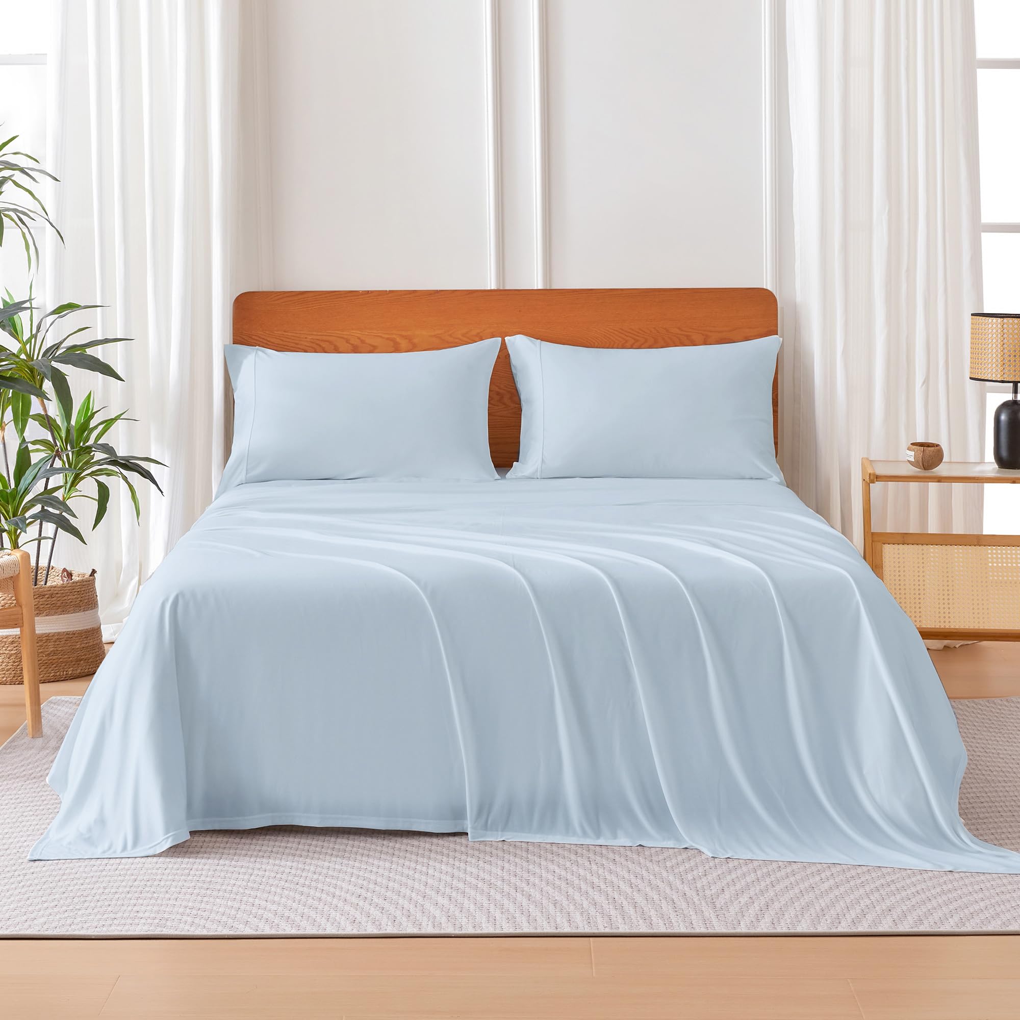 Amazon Basics blue fitted sheet with 16-inch deep pockets for secure mattress fit
