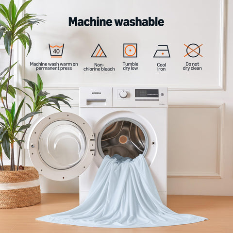Amazon Basics queen blue packaging shows a simple bedside setup