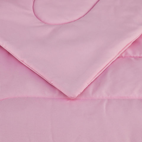 Amazon Basics pink twin fitted sheet demonstrates snug fit and smooth comfort
