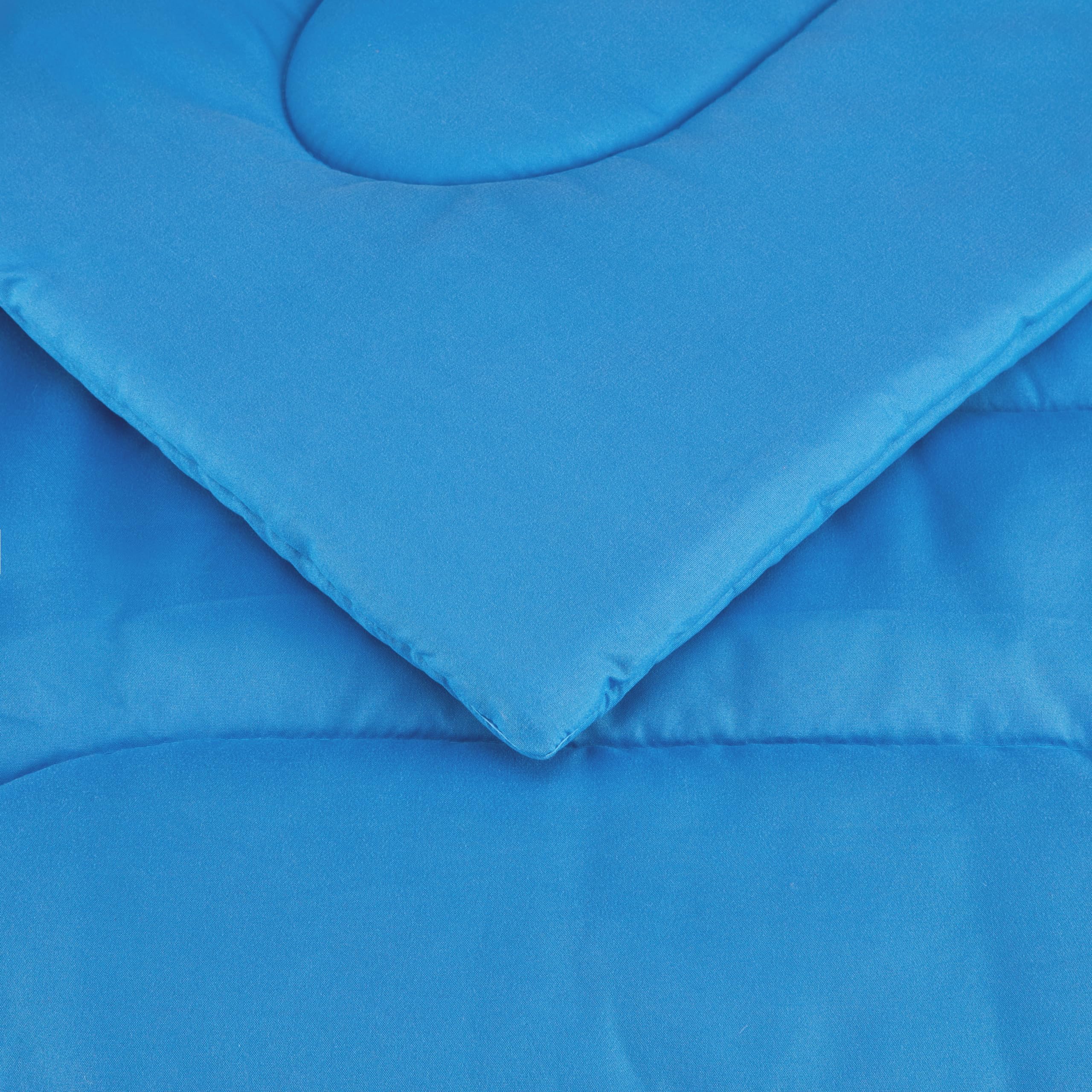 Amazon Basics blue pillowcase finishes the look with soft microfiber finish