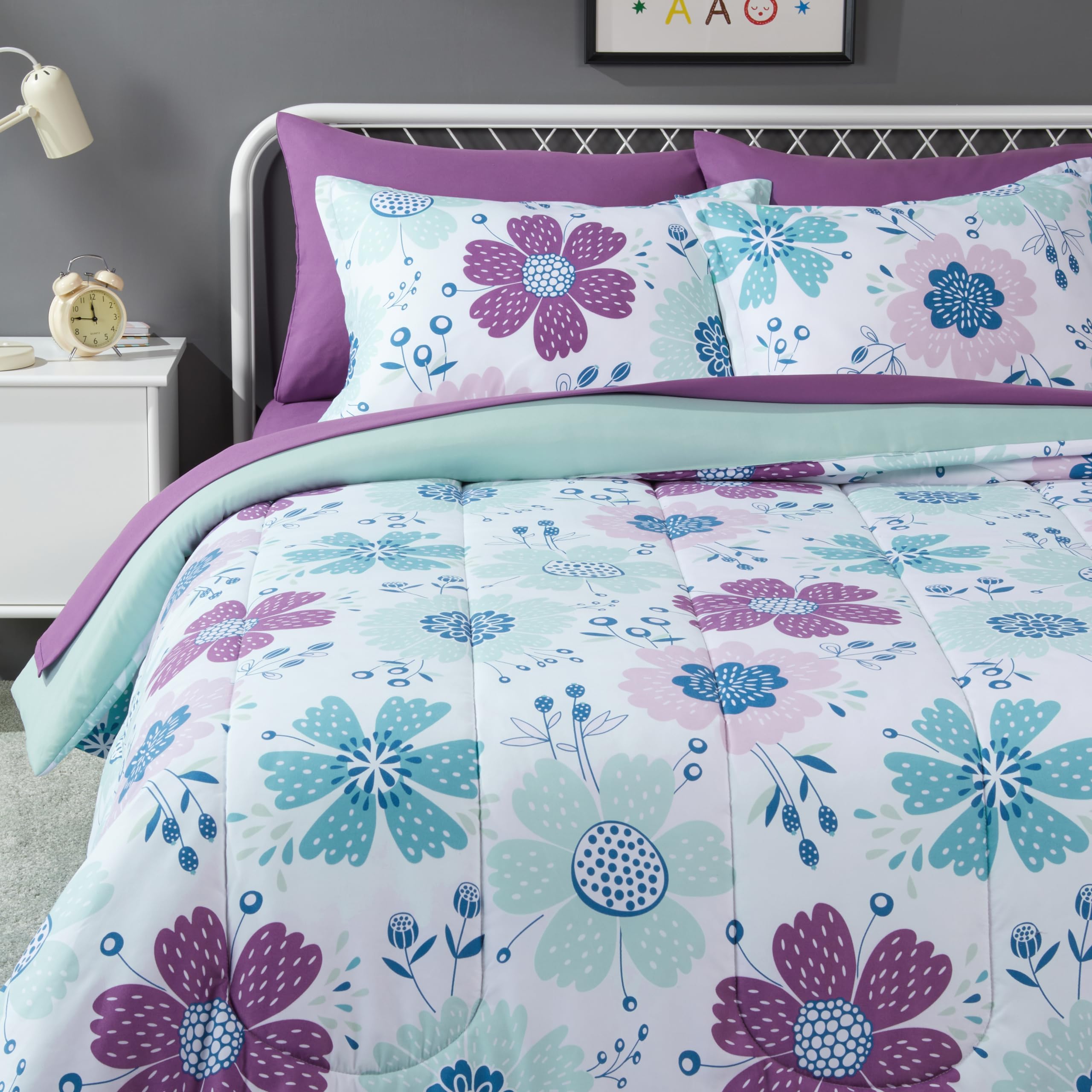 Amazon Basics kids bedding comforter in bluish flowers for soft, durable warmth.