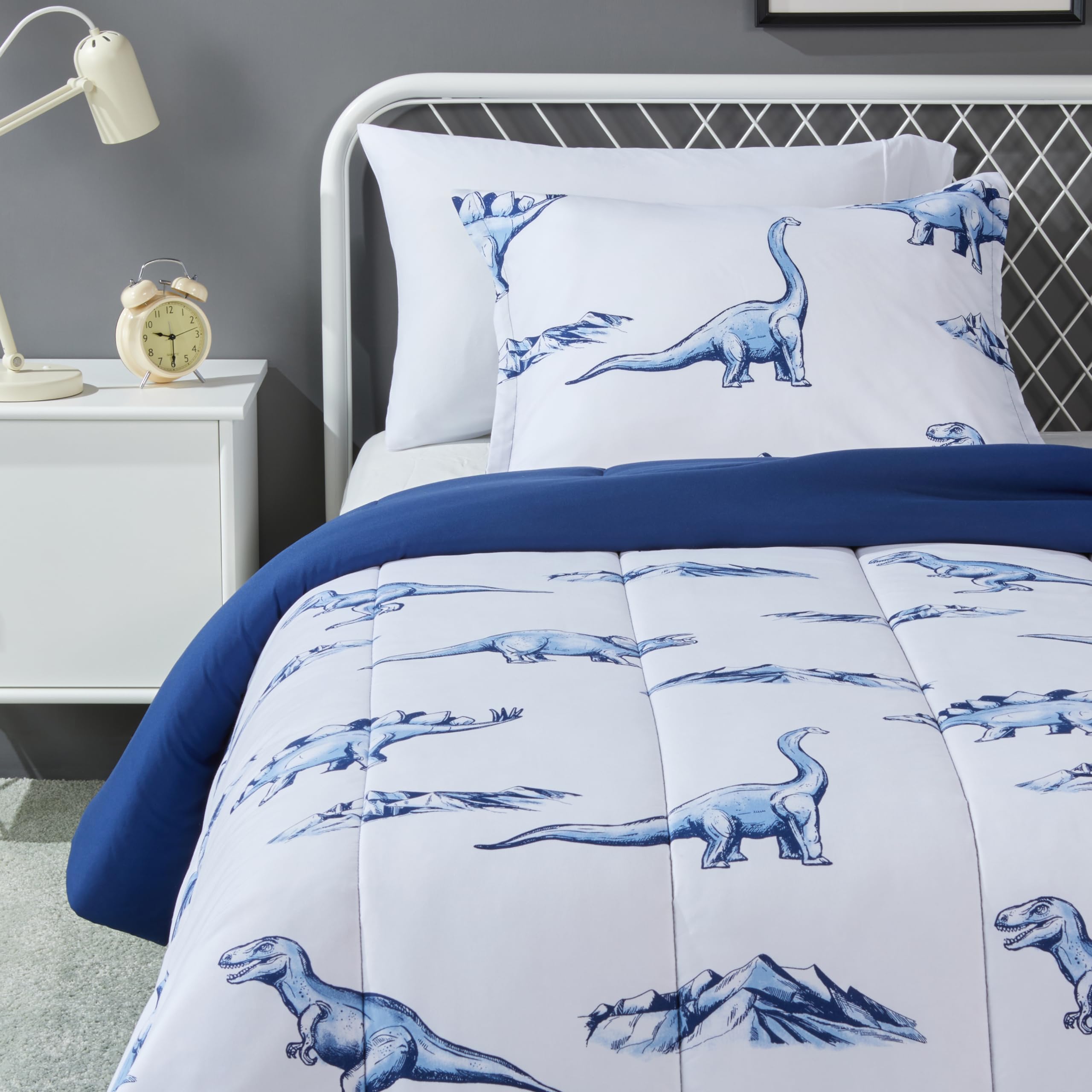 Amazon Basics kids comforter with dinosaurs print offers cozy nights for a twin bed