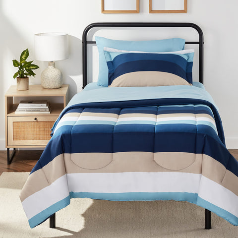 Amazon Basics twin XL lightweight microfiber comforter with blue stripe for cozy nights.