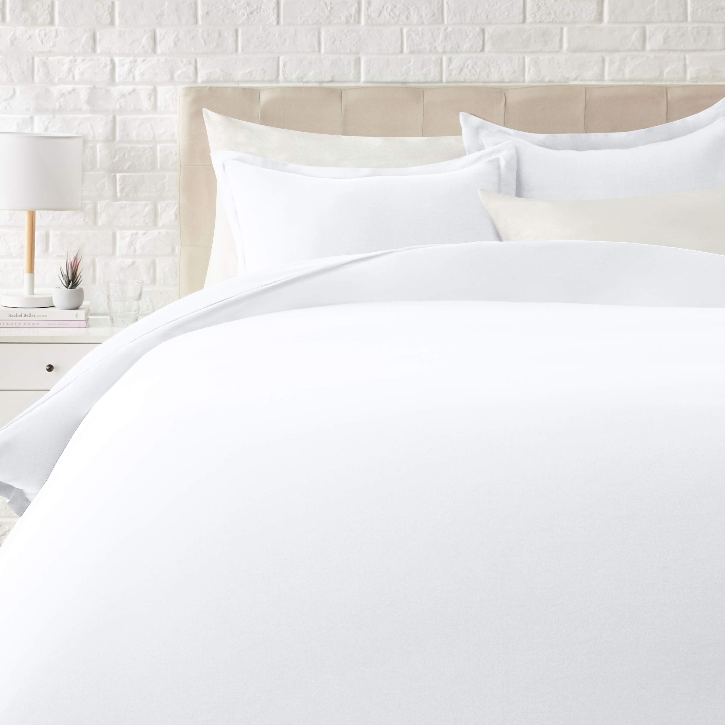 Amazon Basics king duvet cover in bright white, lightweight microfiber for soft, easy care bedding.
